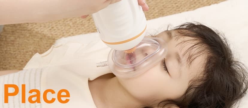 Place the airbag mask on victim's face